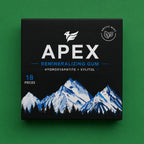 A square black box of APEX Remineralizing Gum, 18 pieces, featuring a white eagle logo, 'Arctic Mica' seal, and a blue and white mountain illustration on a solid green background.