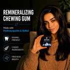 Woman holding Apex remineralizing chewing gum with product features listed.