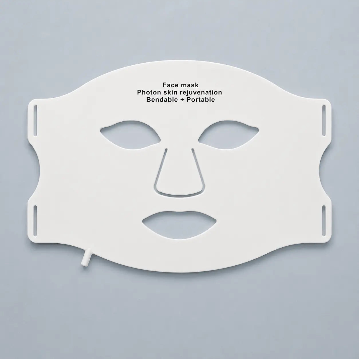 led-face-mask-blue-grey-background.webp