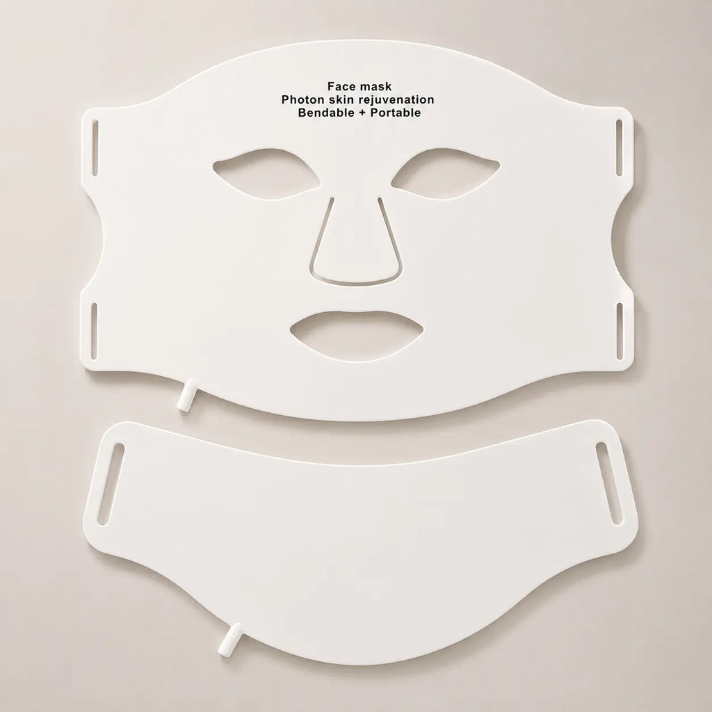 Flexible LED face and neck light therapy mask displayed on a soft stone-grey background in a premium skincare ecommerce setting.