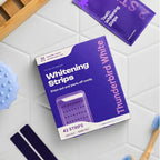 Premium purple teeth whitening strips packaging for convenient at-home whitening